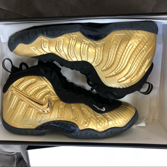 black and gold foamposite grade school